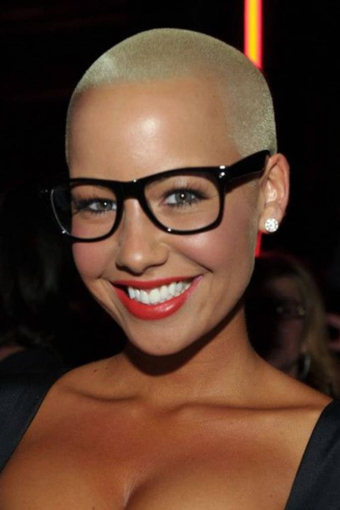 feminine shaved head in glasses