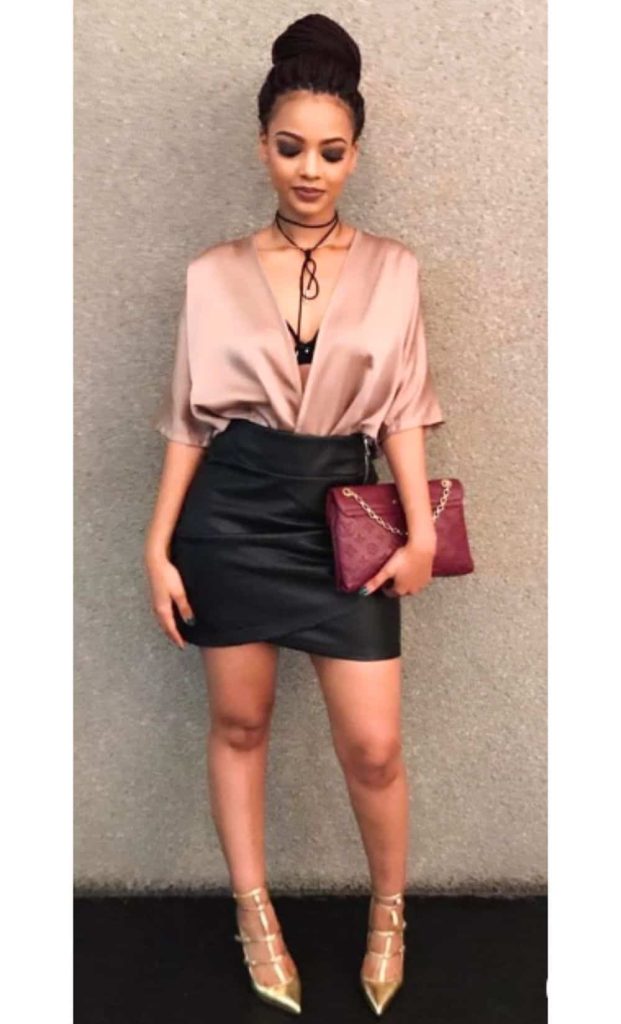 satin shirt and leather skirt outfit