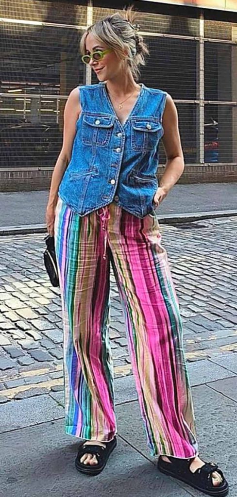 denim waistcoat and rainbow pants
