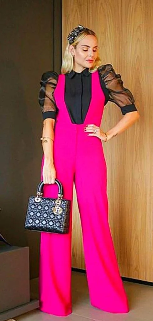 black shirt and pink jumpsuit