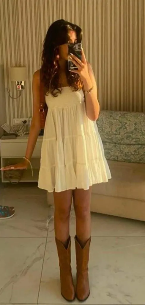 white short dress and cowboy boots